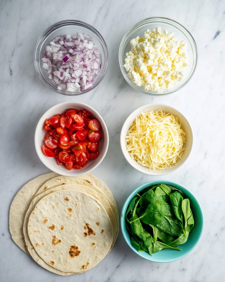 The image shows five small bowls and a stack of tortillas on a white marbled surface. Starting from the top left, a clear bowl holds finely chopped pale purple and white onions. Next to it, another clear bowl contains crumbly white cheese. Below these, a white bowl is filled with bright red cherry tomatoes cut into small pieces. To the right, another white bowl has shredded pale yellow cheese. At the bottom, a pale blue bowl is filled with fresh green spinach leaves. On the left side, there is a stack of three white tortillas with light brown spots. photo taken with an iphone --ar 4:5 --v 7
