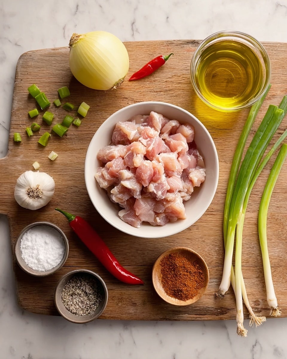A white bowl filled with small pieces of raw pink chicken sits in the center of a wooden board on a white marbled surface. Around the bowl, there are green onions with white ends to the right, a whole yellow onion above it, two small chili peppers (one red and one green), two cloves of garlic to the left, and a small glass container filled with golden cooking oil at the top right. Below the bowl are three small containers: one with white salt, one with black pepper, and one with white flour. A fourth small container with reddish-brown spices is placed near the garlic. The scene is lit well, showing the natural colors and textures of the ingredients. Photo taken with an iphone --ar 4:5 --v 7