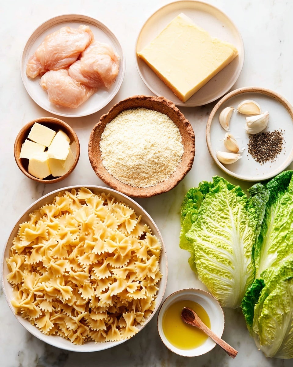 The image shows an arrangement of raw food ingredients on a white marbled surface. On the bottom right, there is a bowl filled with uncooked farfalle pasta, light yellow in color and shaped like small bow ties. To the left of the pasta, there is a smaller bowl holding fine, white breadcrumb-like crumbs. Above that, there is a brown bowl with two small pale yellow butter cubes. Near the top left, a white bowl holds two raw, pale pink chicken pieces with smooth textures. At the top center, a white plate has a wedge of hard cheese with a yellowish rind. To the right of the cheese plate, another white plate holds a white ceramic spoon filled with black pepper and two whole garlic cloves. Next to that, a small white container is filled with golden olive oil. On the far right, there is a bunch of fresh green romaine lettuce leaves with a slightly shiny surface. In the bottom center, a small white bowl contains thick, white sauce or cream with a tiny wooden spoon resting inside. photo taken with an iphone --ar 4:5 --v 7