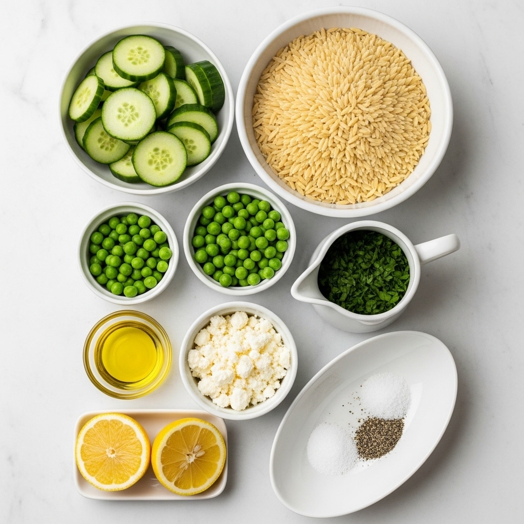 Seven small white bowls are placed on a white marbled surface, each holding a different ingredient. Starting from the top right, the largest bowl is filled with light beige orzo pasta grains, showing a smooth, oval shape. To its left, a medium bowl contains cubed cucumber pieces, light to medium green with a soft texture. Below the orzo, a small bowl holds bright green frozen peas, round and smooth. Next to peas on the right, a small white pitcher-shaped bowl contains finely chopped dark green parsley. Below that, a small bowl has crumbly white feta cheese. Under the peas, a tiny clear glass bowl holds golden yellow olive oil. At the bottom left, a small dish has two lemon halves, showing bright yellow rinds and juicy interiors. Finally, a white oval bowl at the bottom right contains white salt and black pepper mixed on one side. All bowls are displayed neatly with clear labeling on each ingredient. Photo taken with an iphone --ar 4:5 --v 7