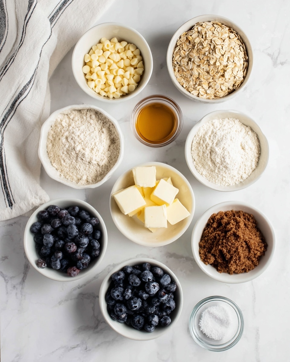 The image shows eight small white bowls and one brown egg arranged on a white marbled surface. From top left to bottom right, the first bowl contains light yellow-white chocolate chips, the second has a small amount of golden-brown liquid, the third holds white flour with a slightly uneven texture, the fourth contains light brown rolled oats, and the fifth is filled with soft, light yellow butter cubes. The sixth bowl is filled with fresh, plump blueberries, the seventh has a dark brown, crumbly brown sugar, the eighth bowl contains a white powder, and the last small glass bowl holds a bit of salt. A white cloth with black stripes is casually placed in the top left corner. Photo taken with an iphone --ar 4:5 --v 7