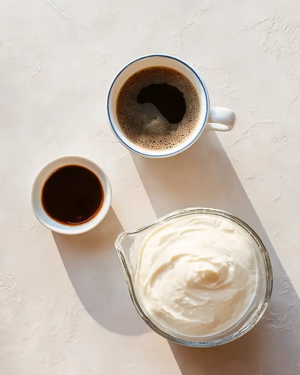 The image shows three containers on a white marbled surface: at the bottom right is a clear glass jug filled with a thick, smooth, white cream; at the top center is a white cup with a blue rim, filled with dark brown coffee with light froth in the middle; at the bottom left, there is a small white bowl containing a small amount of thick dark brown sauce. The items are spaced apart with soft natural light, creating gentle shadows. Photo taken with an iphone --ar 4:5 --v 7