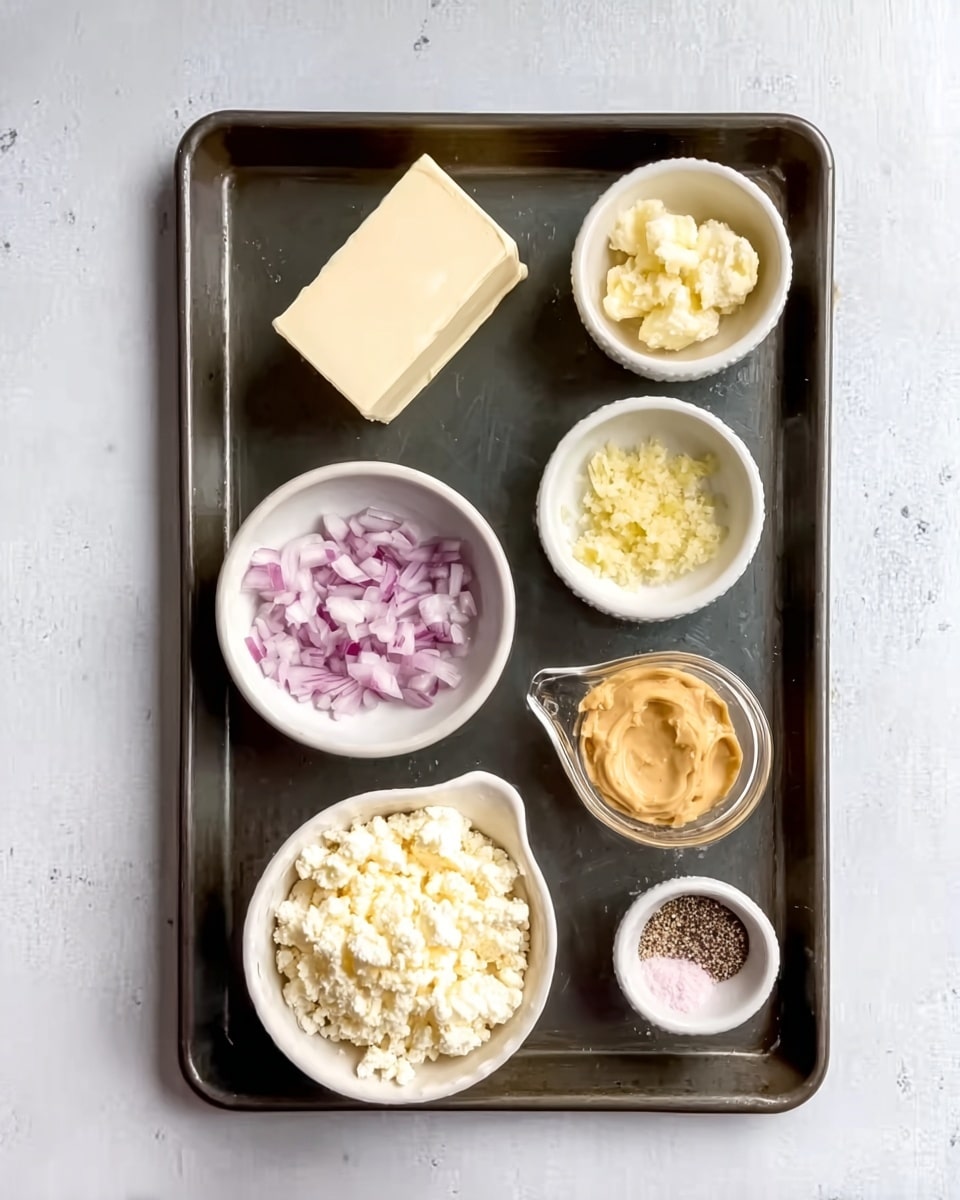 The image shows a dark baking tray placed on a white marble surface with five small containers arranged neatly on it. In the top left corner, there's a rectangular block of white butter. Below it, a small white bowl filled with finely chopped light purple onions. To the right of the onions, a small white bowl contains minced garlic with a pale yellow color. Next to the garlic, there's a small glass bowl with a thick, smooth, golden-brown paste. Below these, a white measuring cup filled with crumbly white cheese sits on the tray. Finally, in the bottom right corner, a small white bowl holds a combination of black pepper and pink salt. Photo taken with an iphone --ar 4:5 --v 7