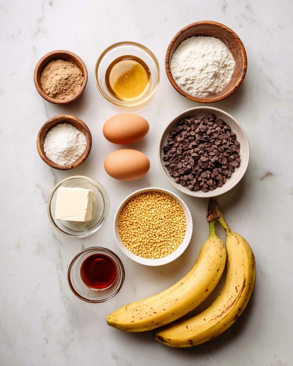 The image shows an overhead view of different cooking ingredients arranged neatly on a white marbled surface. Starting from the top left, there is a small wooden bowl with a light brown powder, followed by a clear glass bowl with honey that is golden and shiny. Next, a small wooden bowl holds a fine white powder. Below that, another wooden bowl contains a pale powder, and under it, a small wooden bowl has white granules that look like salt. In the center-right, a white bowl is filled with dark brown chocolate chips, and below it, there’s a white bowl containing yellow split lentils. To the right of the chocolate, a small white cup holds a dark amber liquid, and next to it, a glass cup contains white creamy butter. Two yellow bananas with minor brown spots lie to the right of the lentils. At the bottom left, there are two brown eggs side by side. At the top right, a clear glass bowl has a colorless liquid, possibly oil or water. Everything is set on a clean white marbled surface giving a bright and natural look photo taken with an iphone --ar 4:5 --v 7