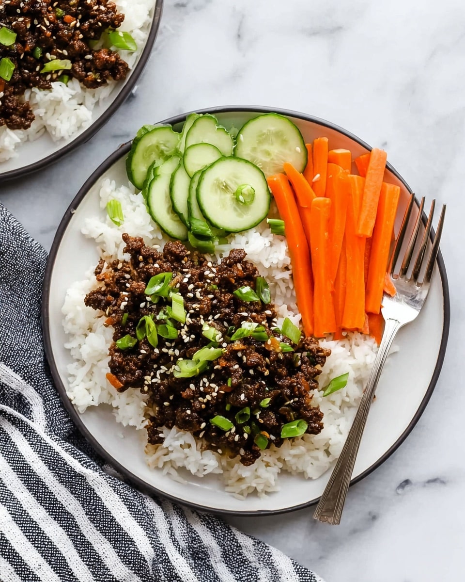 The dish is served on a white plate with three layers. The bottom layer is white rice, soft and fluffy. On top of the rice is a layer of cooked, crumbled dark brown meat mixed with small green onion pieces and sprinkled with white sesame seeds. The top layer has bright orange carrot sticks and thin green cucumber slices arranged in a neat pile. A silver fork rests on the right side of the plate. The background is a white marbled surface with a gray and white striped cloth near the plate. Photo taken with an iphone --ar 4:5 --v 7