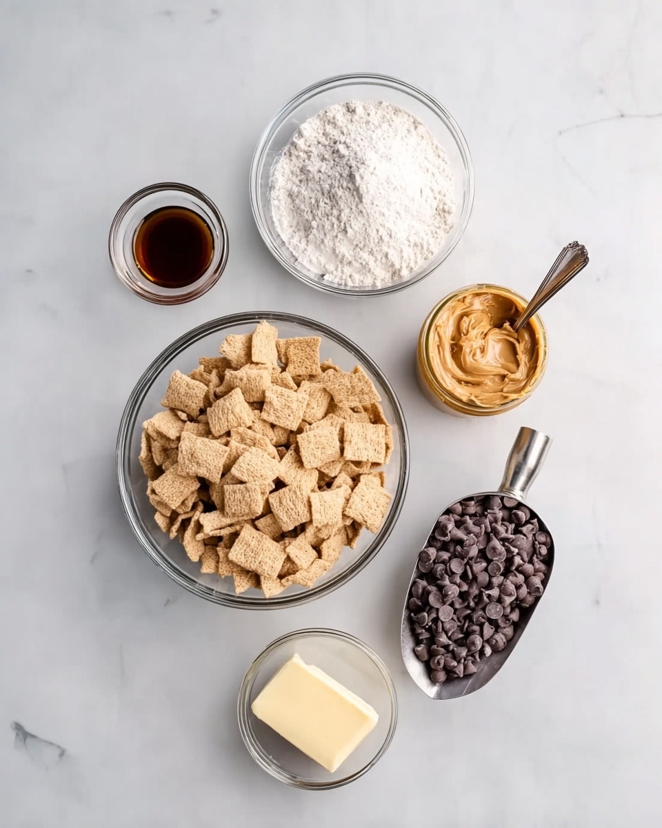 The image shows six baking ingredients placed on a white marbled surface. At the bottom center, there is a clear glass bowl filled with light brown square cereal pieces. Above it and slightly to the left, there is another clear glass bowl filled with white powdered sugar. To the right of the powdered sugar bowl, there is a jar of peanut butter with a metal spoon inside, showing a creamy light brown texture. Next to the jar on its right side, there is a metal scoop filled with dark brown chocolate chips. Above the chocolate chips and slightly to the left, there is a small glass bowl containing a dark brown liquid, possibly vanilla extract. In the center between the powdered sugar and the chocolate chips, there is a small block of light yellow butter. All items are neatly arranged on the white marbled background. Photo taken with an iphone --ar 4:5 --v 7
