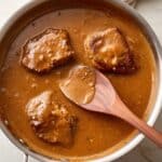 Southern Smothered Chicken Thighs with Gravy and Rice Recipe