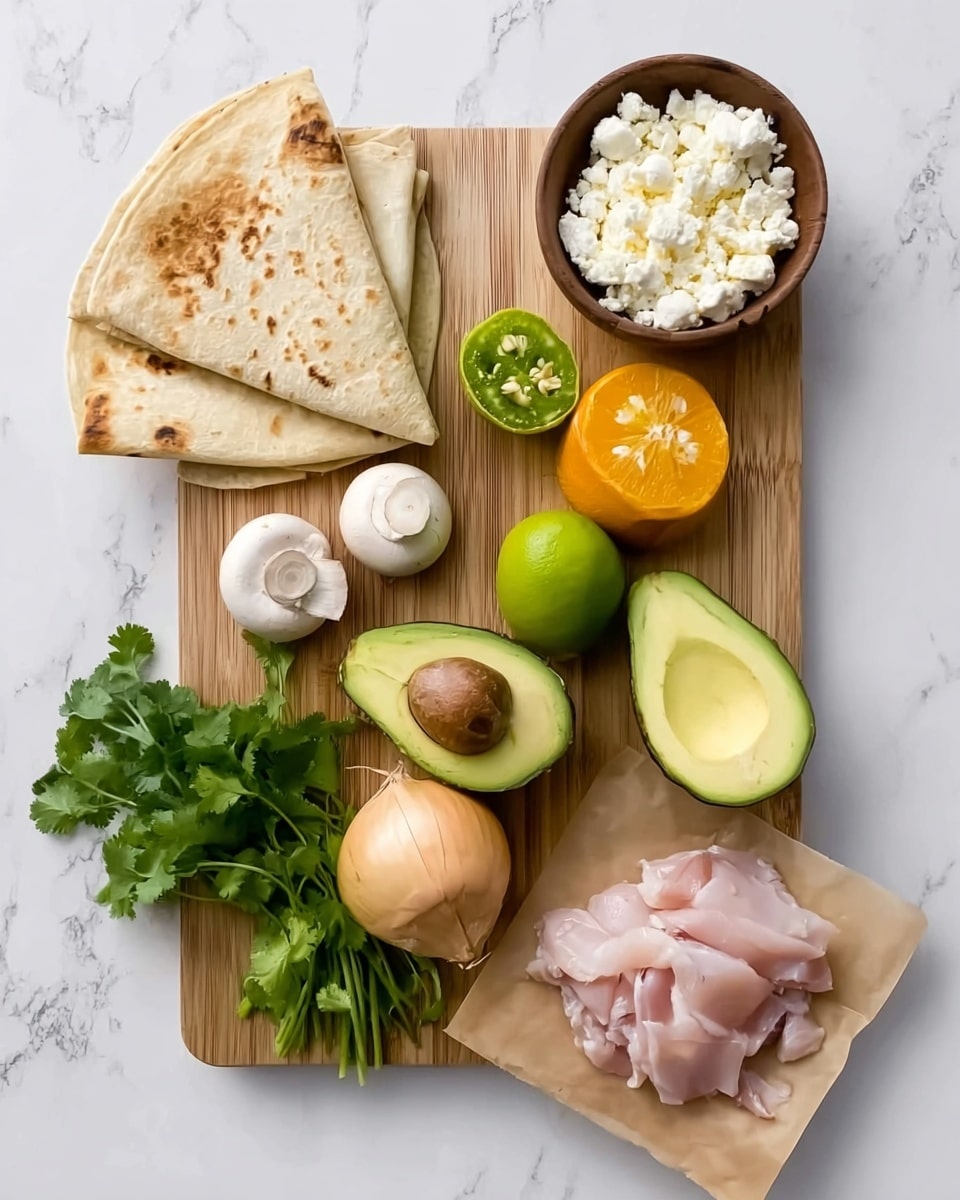 A wooden board with nine food items arranged: three fresh green chili slices and two small white mushrooms on top, a bright orange half and a green lime half in the middle, a whole yellow onion near the bottom, half an avocado with seed removed, and a bunch of fresh green cilantro at the bottom. Next to the board on a white marbled surface is a white plate holding two folded pieces of light brown flatbread. Below the plate is a small brown bowl filled with white crumbly cheese. At the bottom right corner is a small square of unwrapped raw pink chicken on butcher paper. Photo taken with an iphone --ar 4:5 --v 7