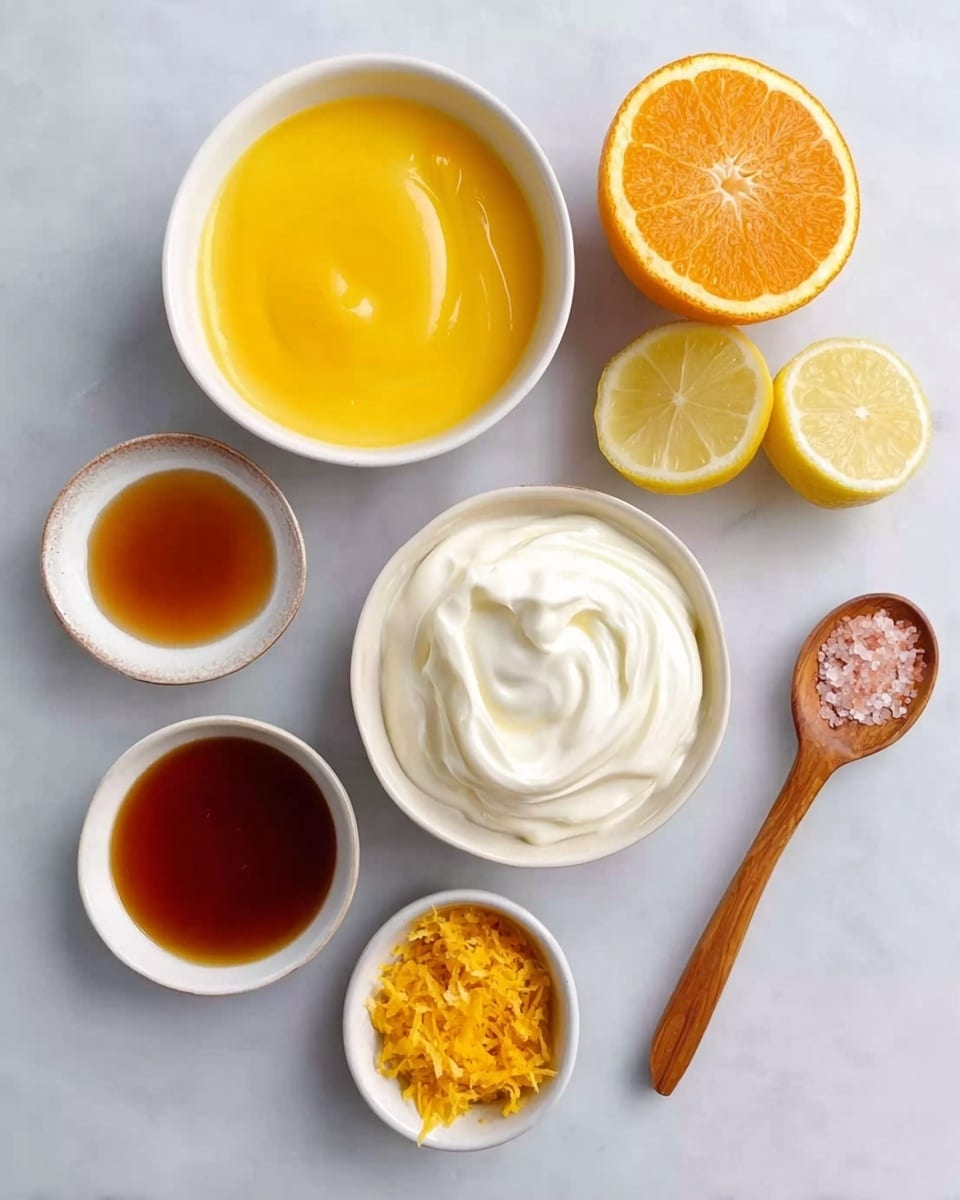 The image shows a simple arrangement of seven white bowls and a small wooden spoon on a white marbled surface. The top left bowl contains smooth, bright yellow mixture, with a half sliced orange beside it, showing its juicy, segmented inside. Below this is a bowl filled with thick white cream, swirled gently on the surface. To its right lies two lemon halves, cut side up, displaying their pale yellow and juicy flesh. A small bowl with finely grated orange zest is placed below the lemons. Near the bottom left, a bowl holds dark amber liquid with a glossy surface. Next to it, a smaller bowl carries a slightly darker amber liquid. Finally, a small wooden spoon rests on the right edge, holding a pinch of fine pink salt. photo taken with an iphone --ar 4:5 --v 7